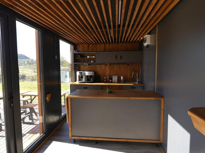 Cafetería contenedor con porche y terraza