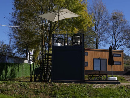 Cafetería contenedor con porche y terraza